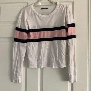 White and pink ribbed long sleeve shirt.